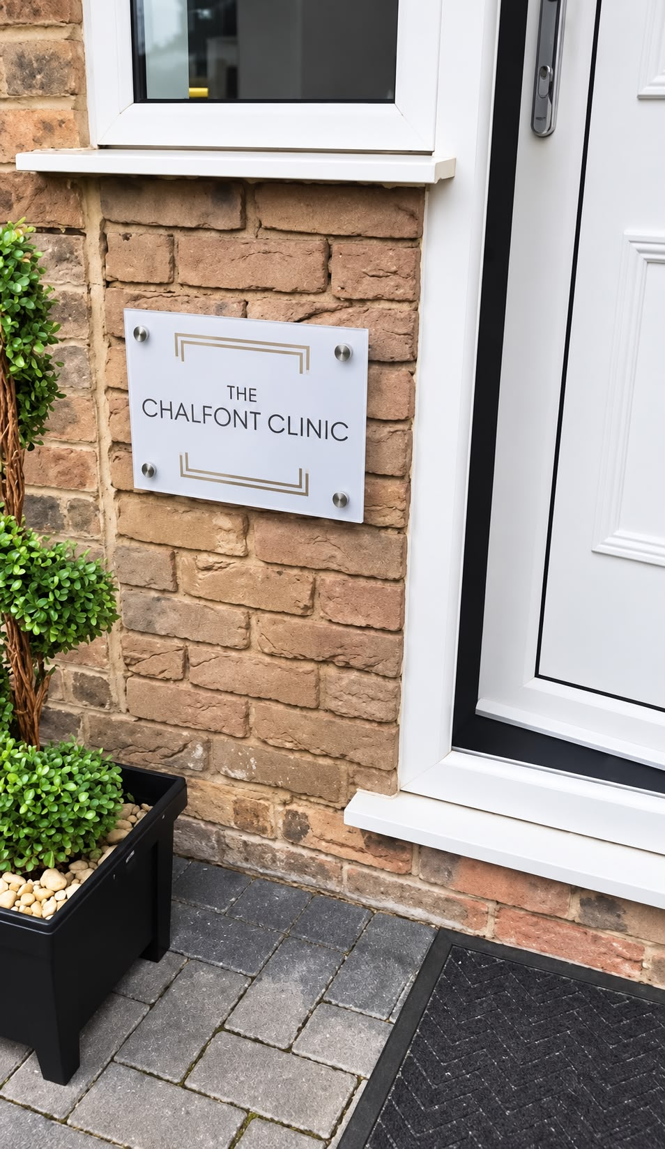 The entrance and sign of The Chalfont Clinic